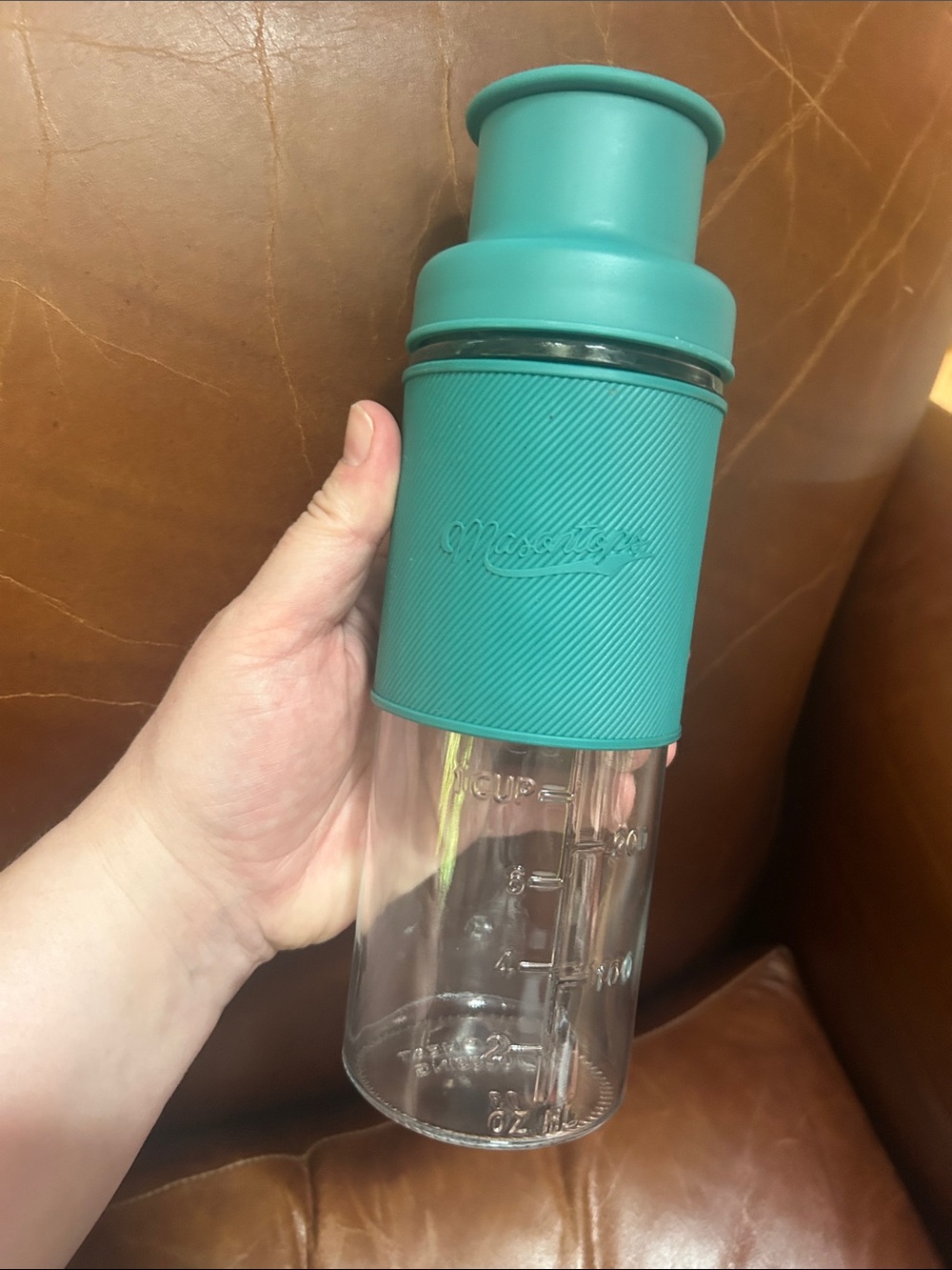 Masontops Cocktail Shaker Kit, which includes a 20oz glass mason jar with a teal